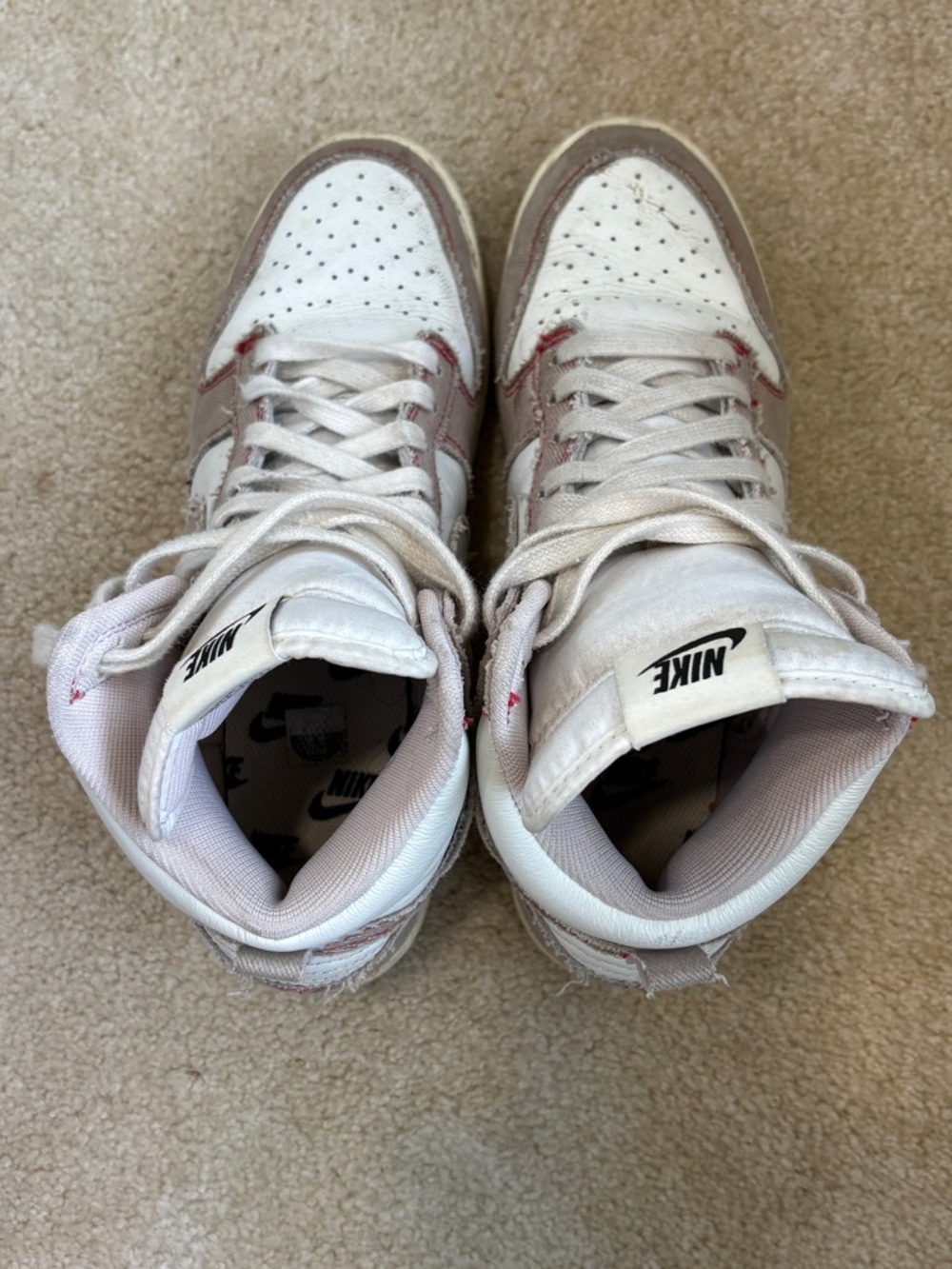 Nike Women's High-Top Sneakers in White with Light Pink Details